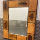 Ceramic wall mirror with herbarium decor circa 1960