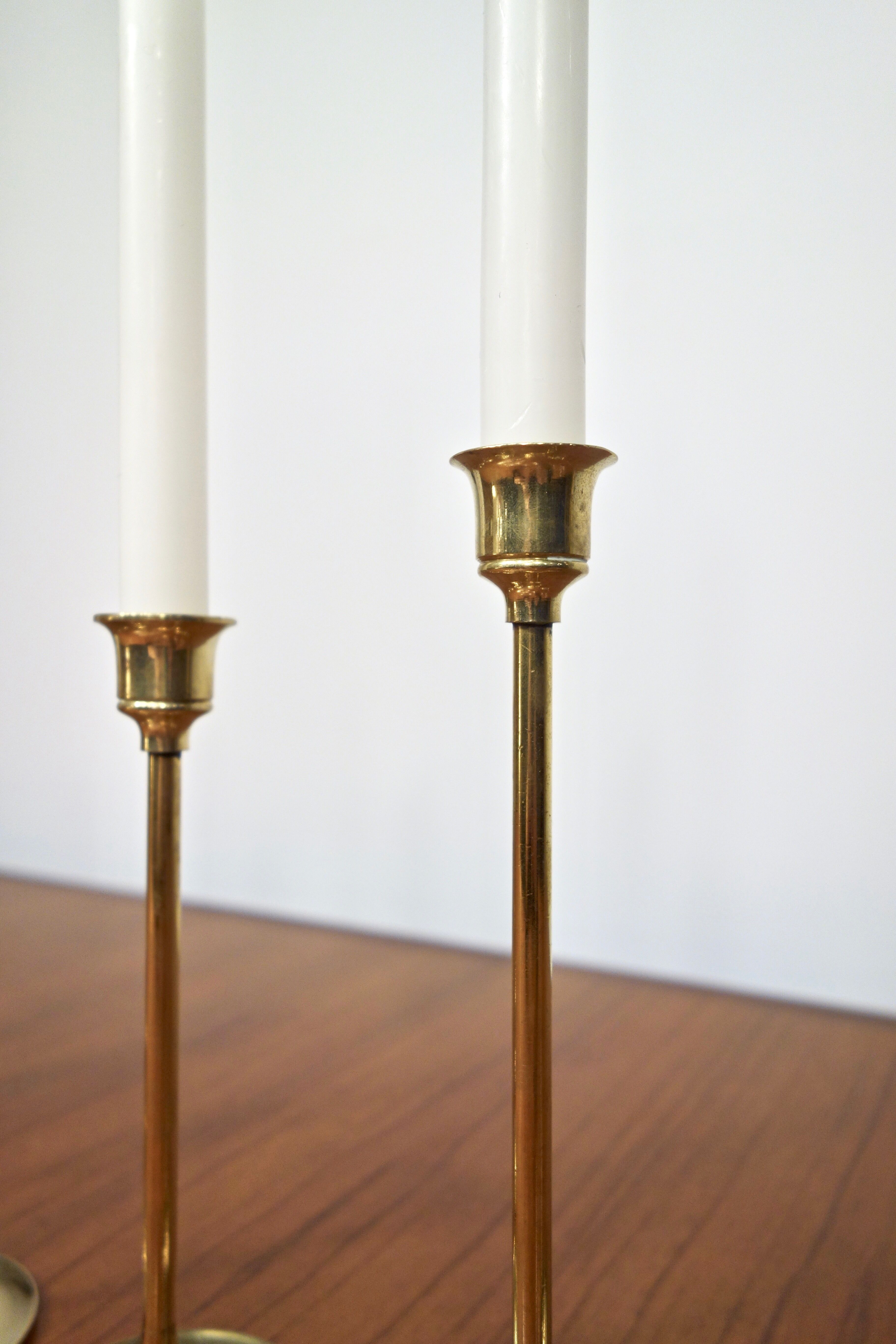 Set of 7 Scandinavian brass candle holders, 1960's