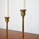 Set of 7 Scandinavian brass candle holders, 1960's