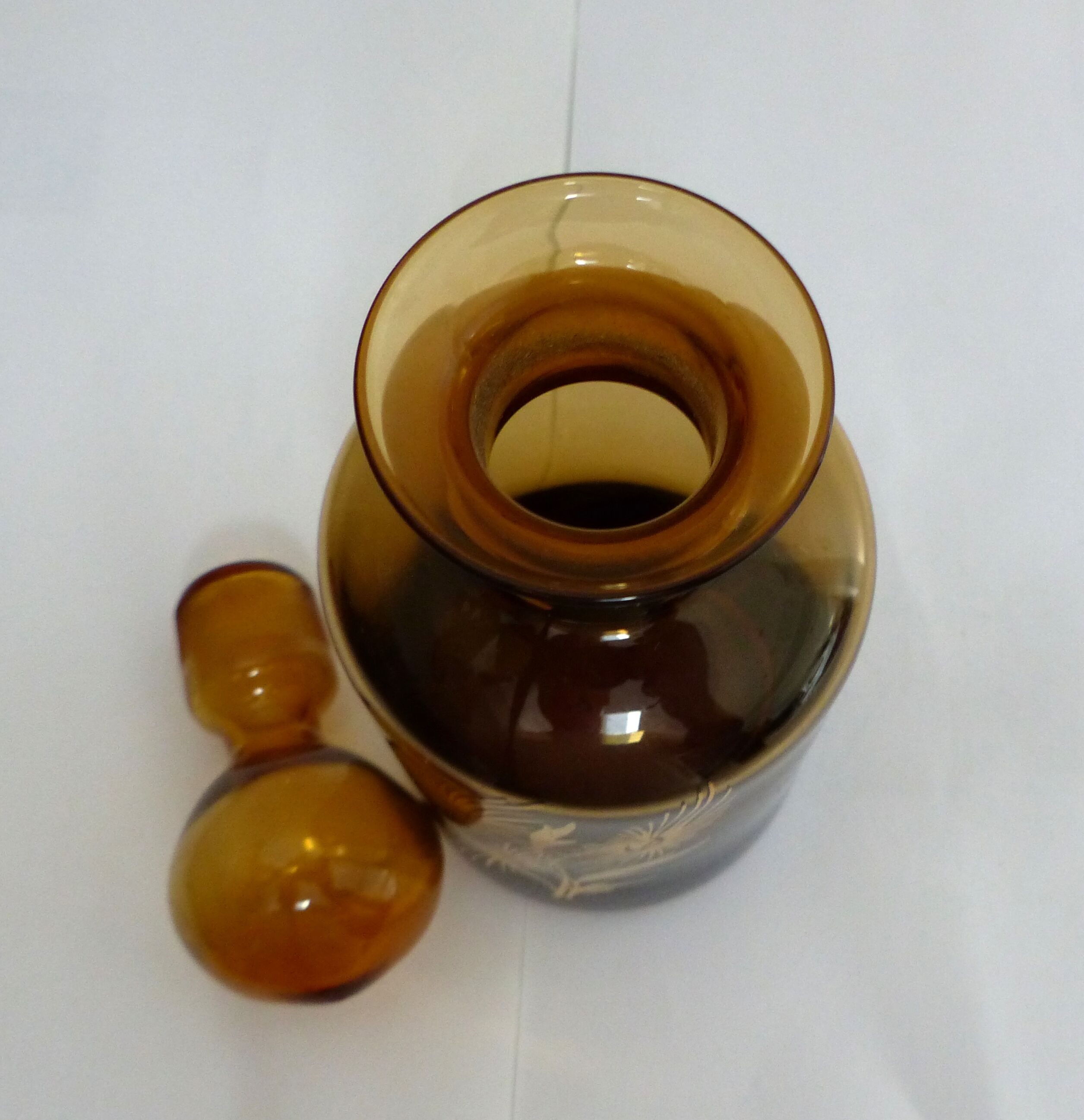 Decorated and signed perfume bottle, brown glass, painted "by hand Clary Paris"