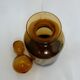 Decorated and signed perfume bottle, brown glass, painted "by hand Clary Paris"