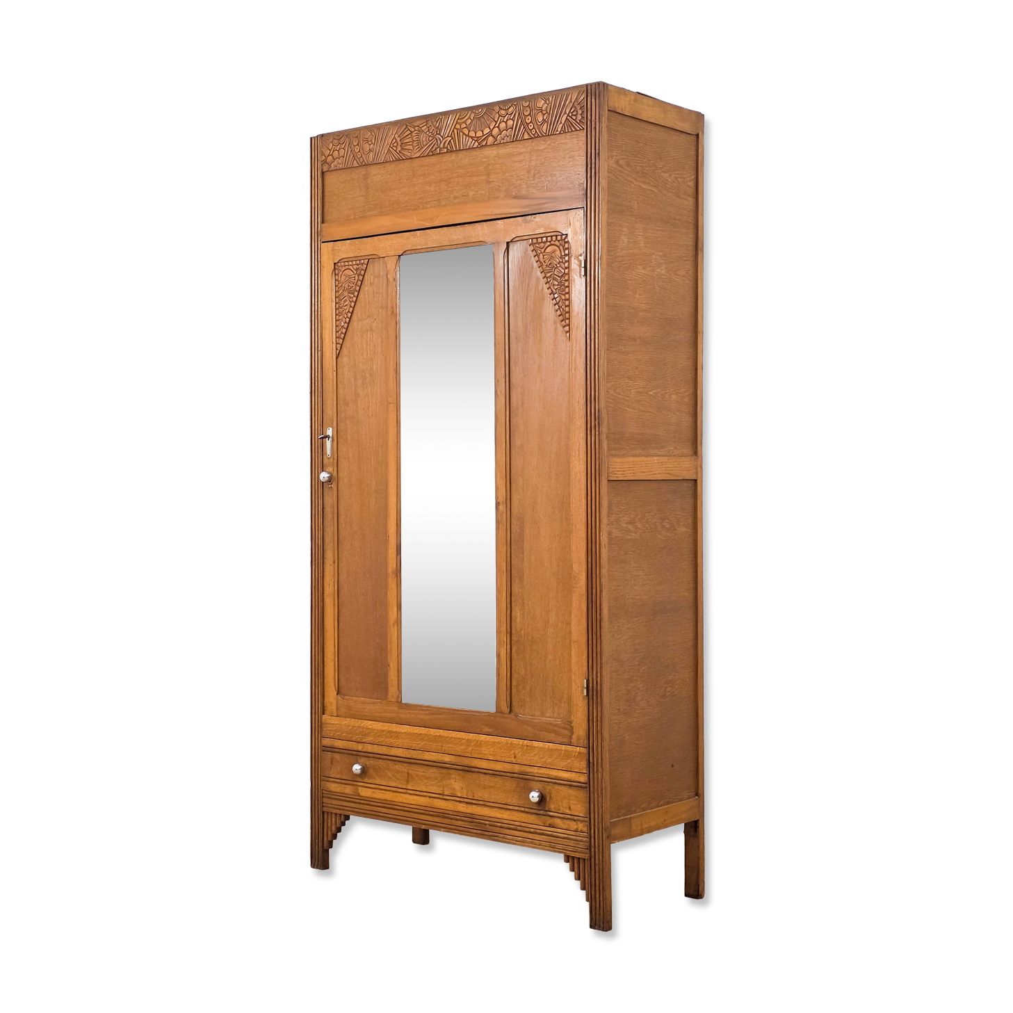 Art Deco wardrobe in carved wood with mirror from the 1930s.