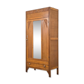 Art Deco wardrobe in carved wood with mirror from the 1930s.