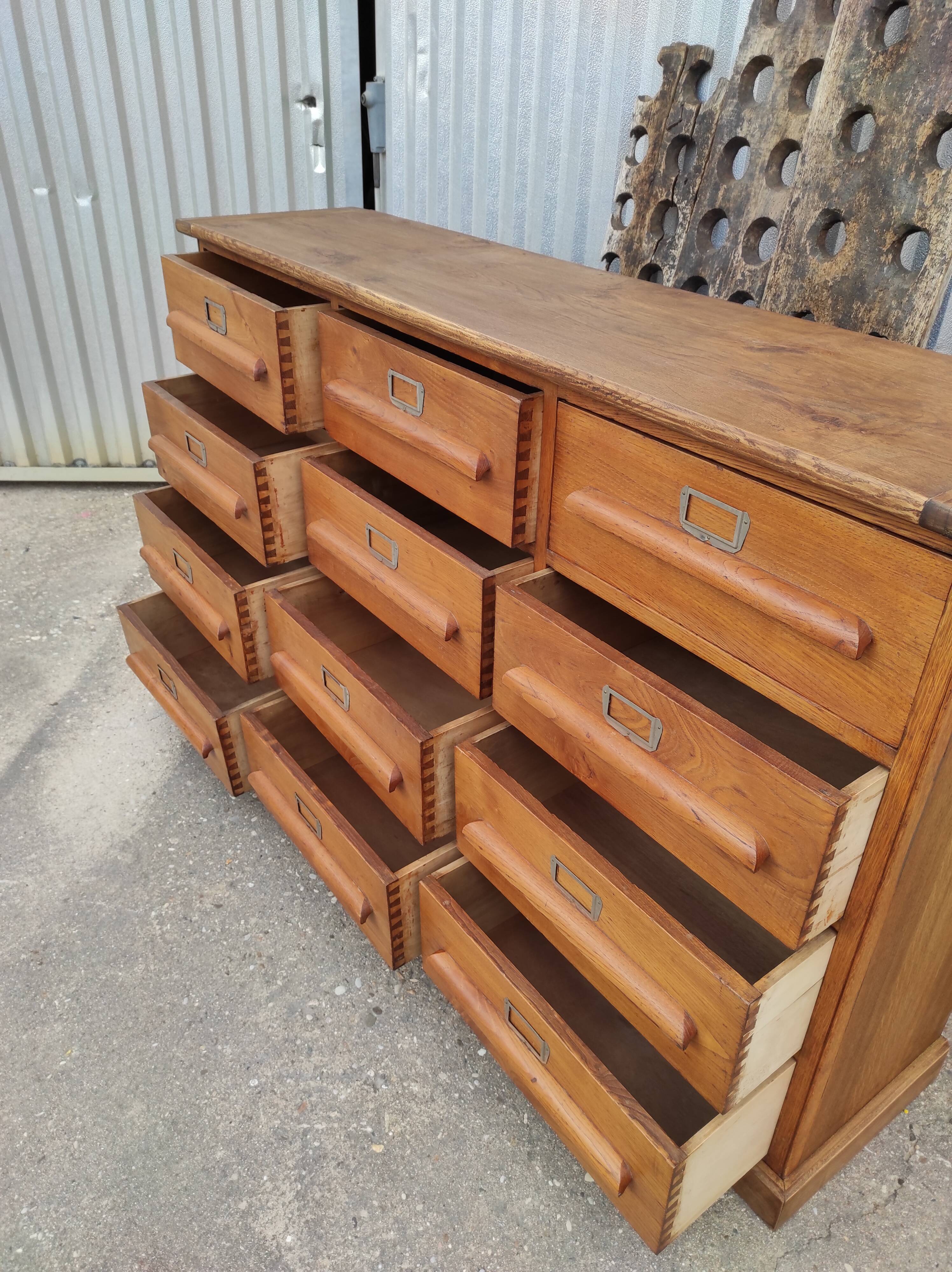 Trade furniture with 12 drawers in gilded oak
