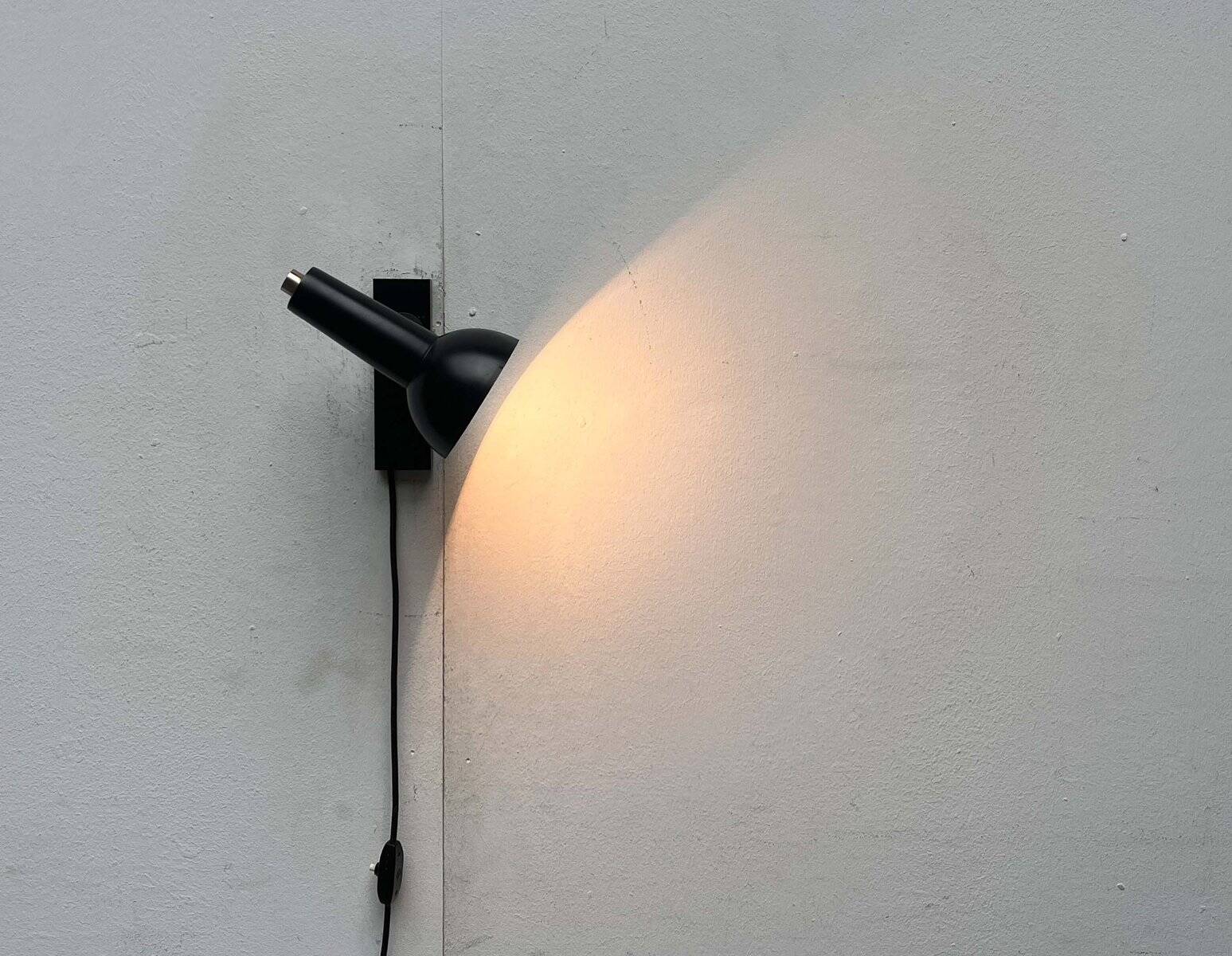 Mid-century German black minimalist wall lamp by Hustadt, 1960s.