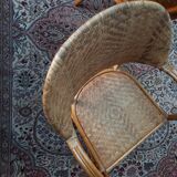Pair of armchairs in braided rattan 70s