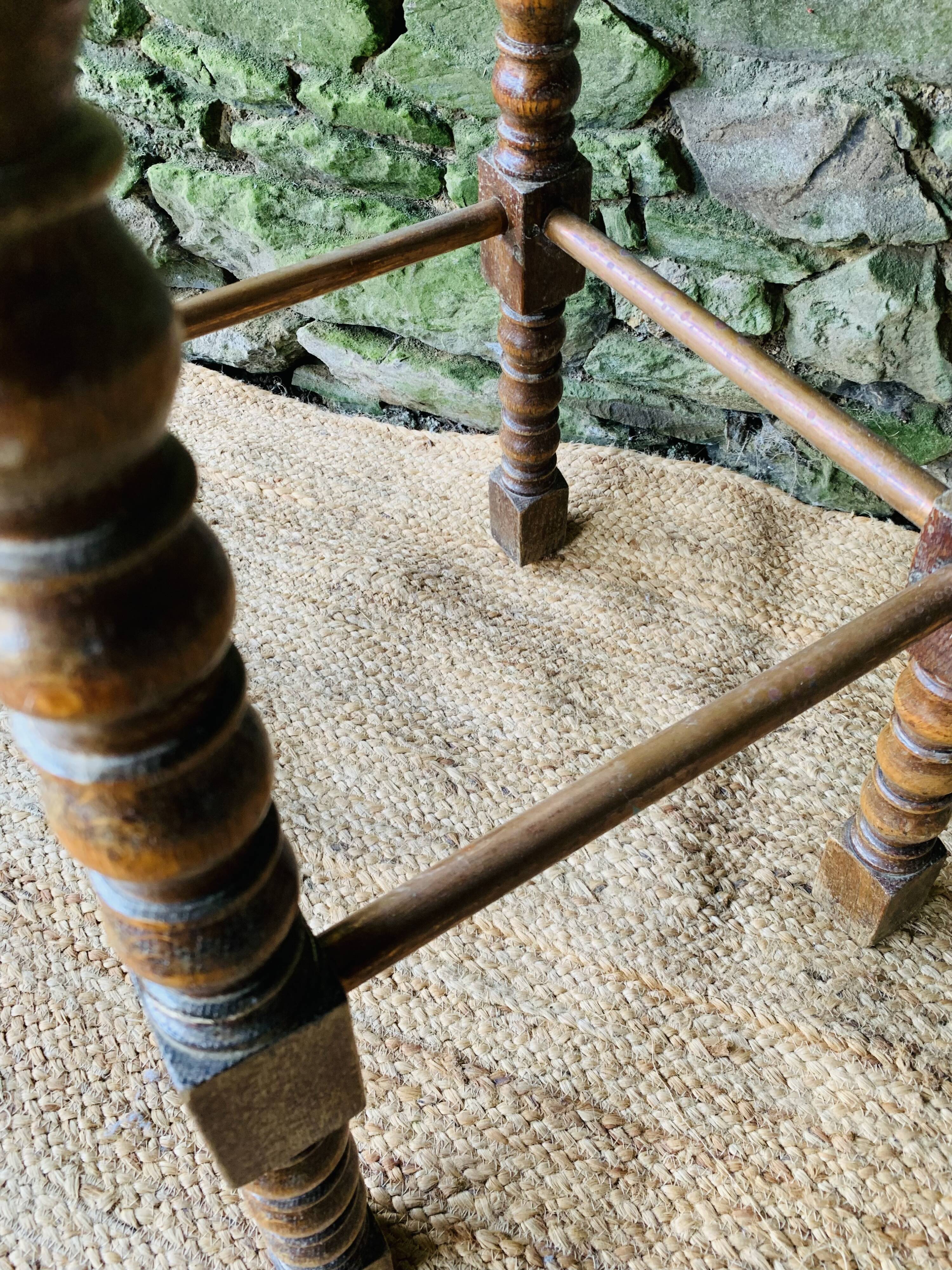 High stool in turned wood