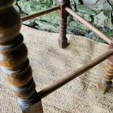 High stool in turned wood