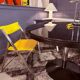 Round dining table, 1980s, black stained wood with glass top