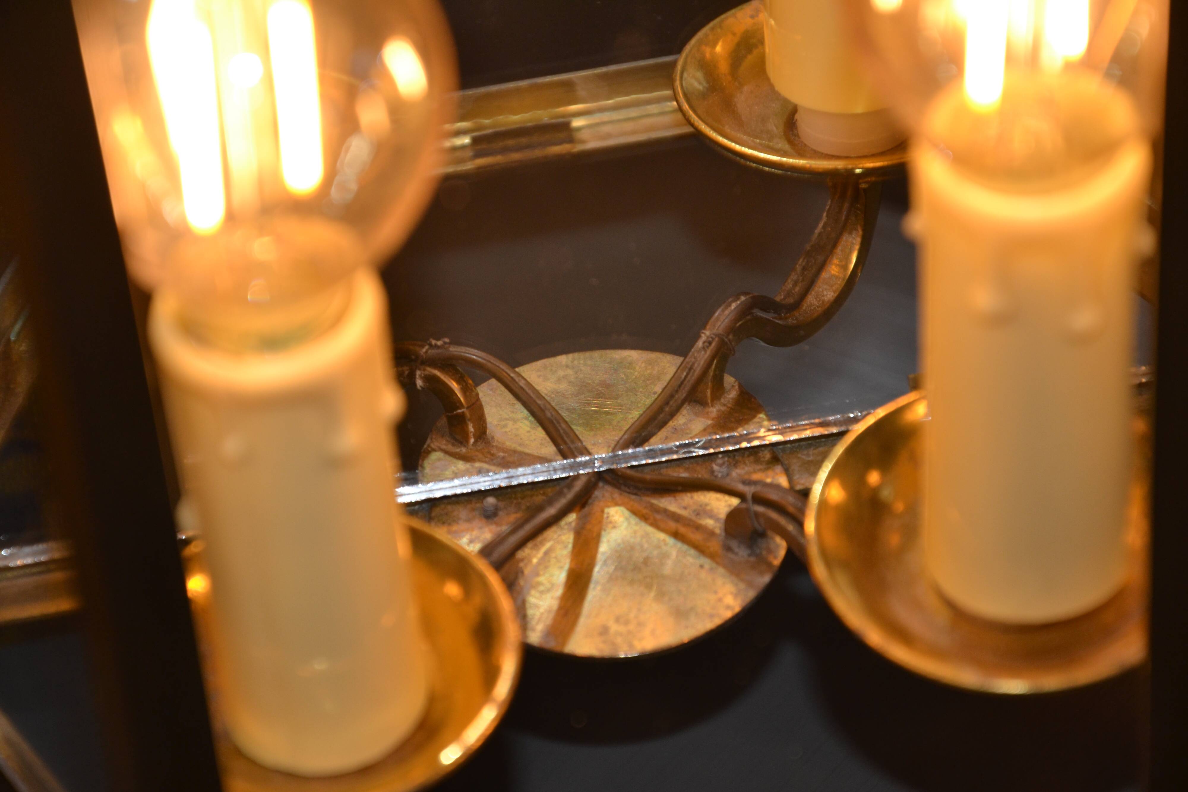 Antique glass wall light in brass