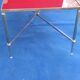 Brass coffee table with red glass top