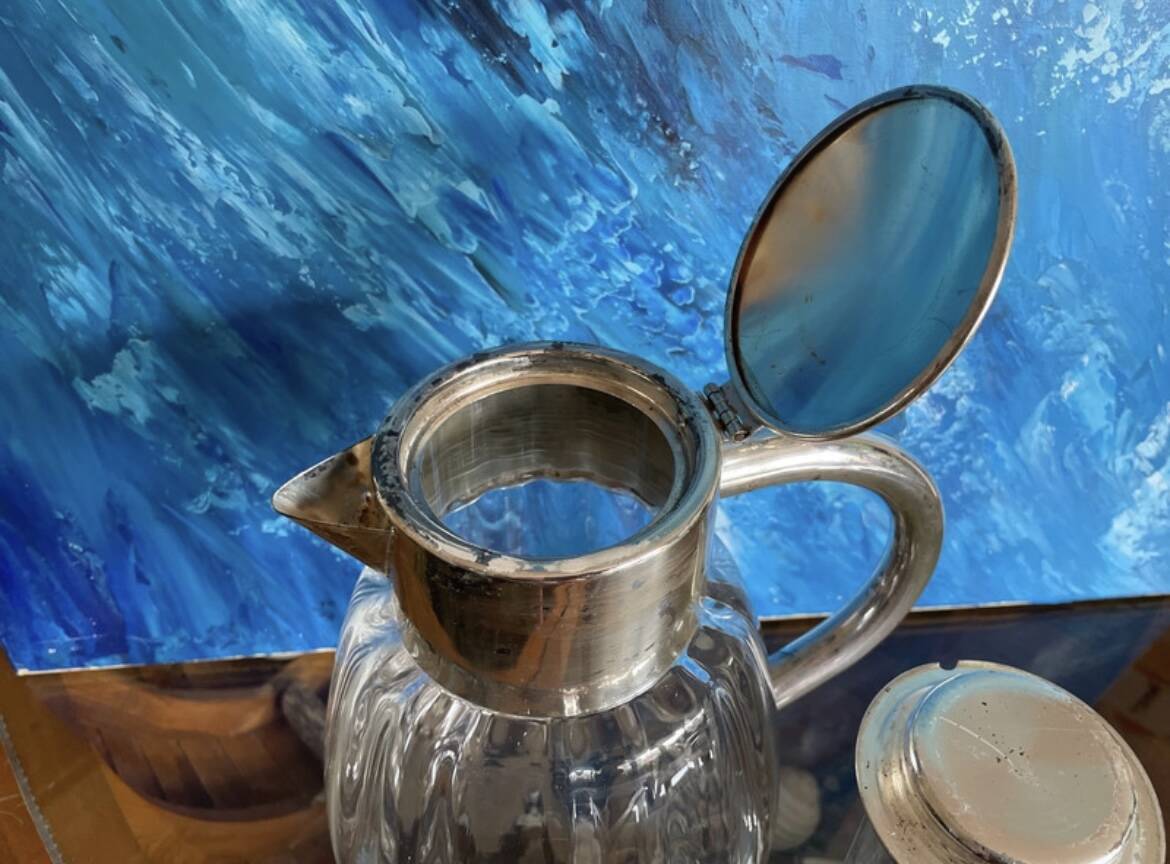 Antique pitcher with ice cooler tube