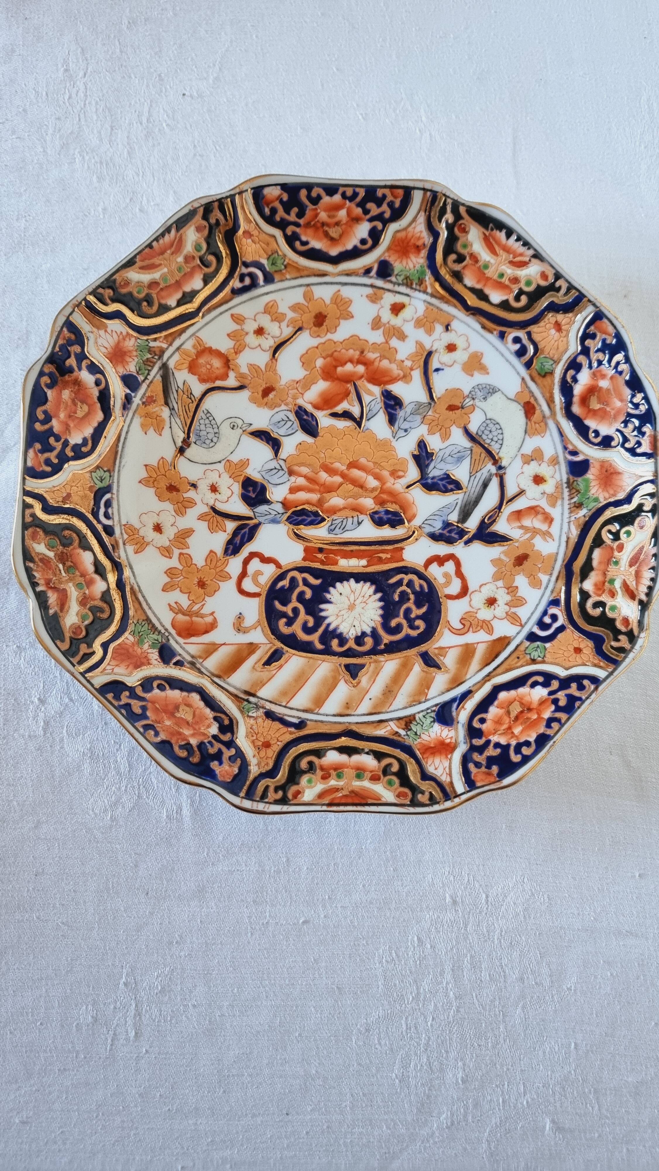 Imari-style porcelain plate, hand-painted, Japan, mid-20th century.
