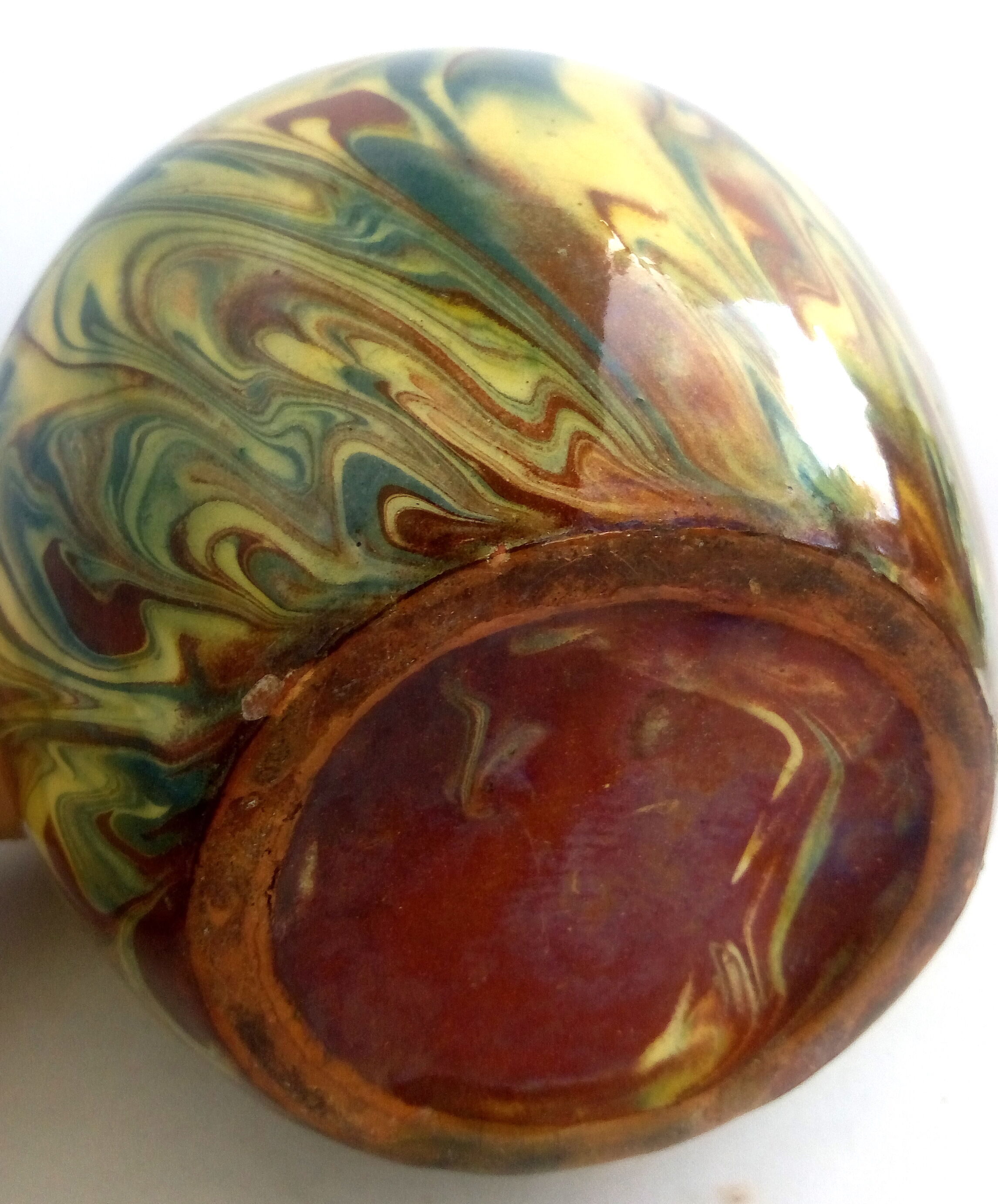 Brown, yellow and green marbled ceramic vase
