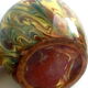 Brown, yellow and green marbled ceramic vase