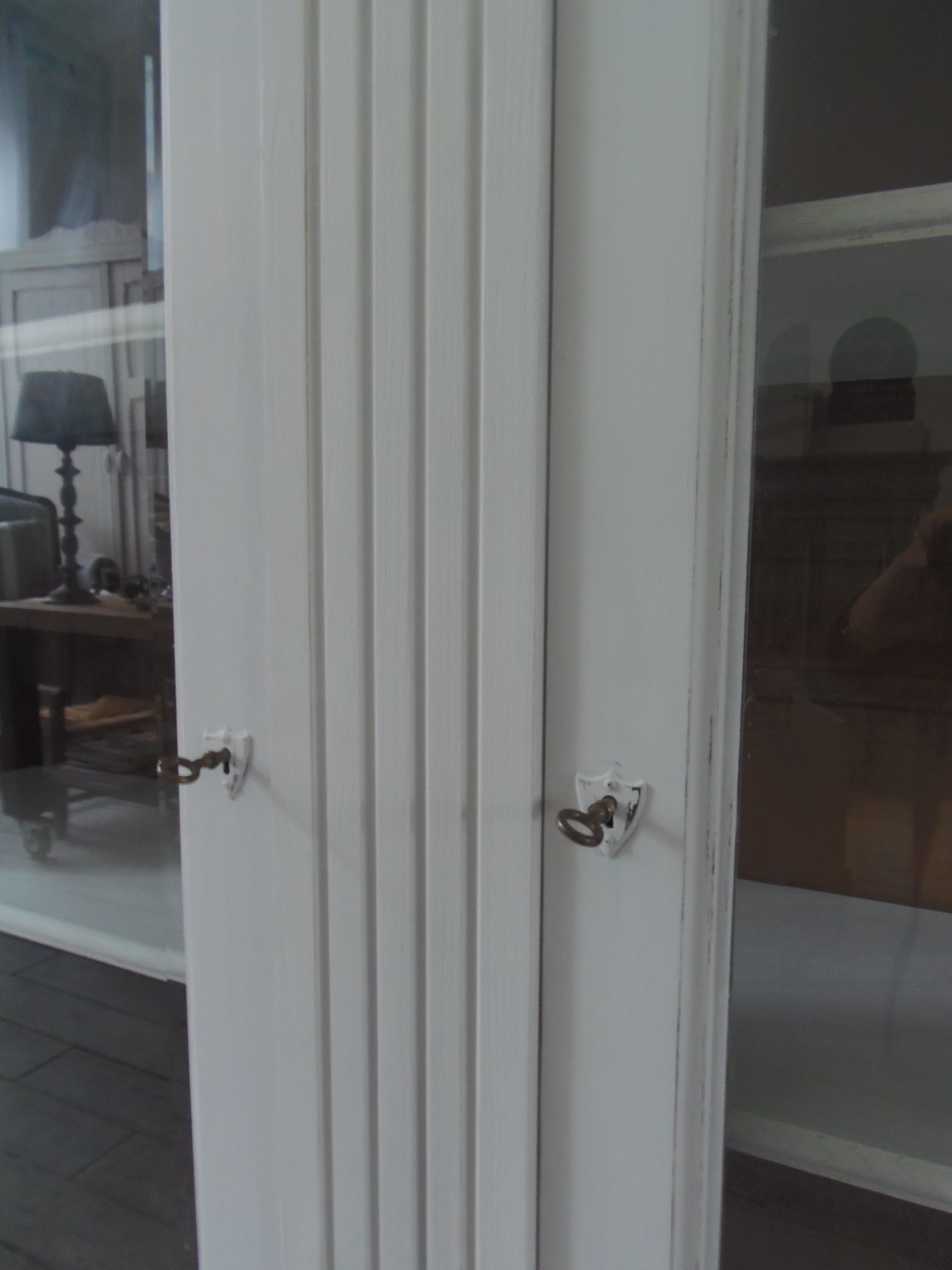 Showcase, bookcase, dresser style louis philippe patinated pearl gray, 2 glass doors.