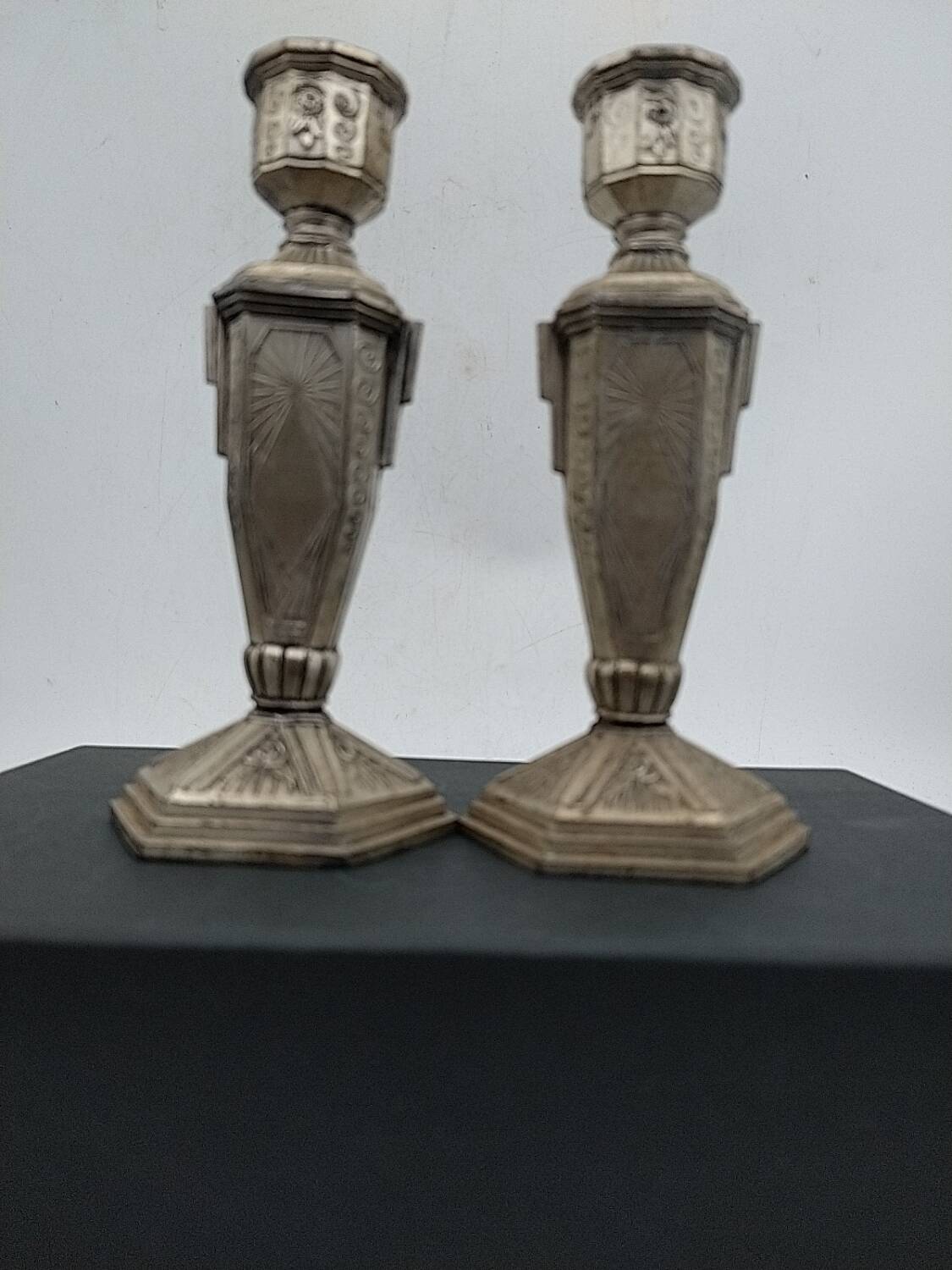 Art Deco metal candle holders.