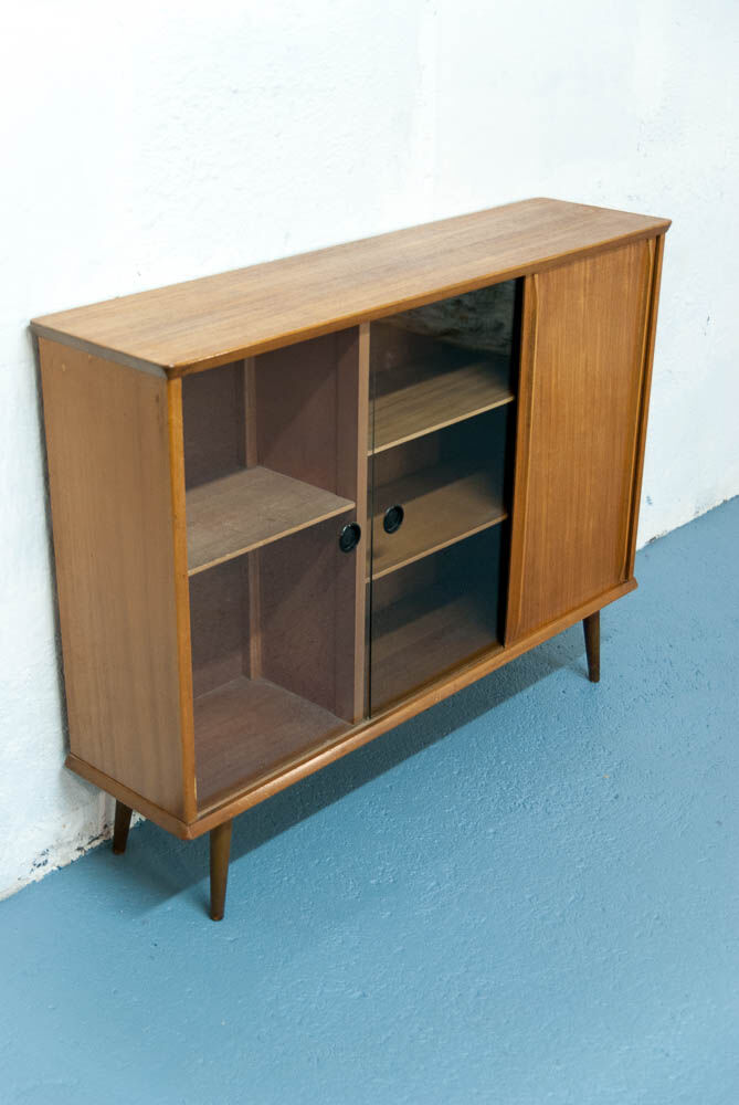 Console with sliding doors