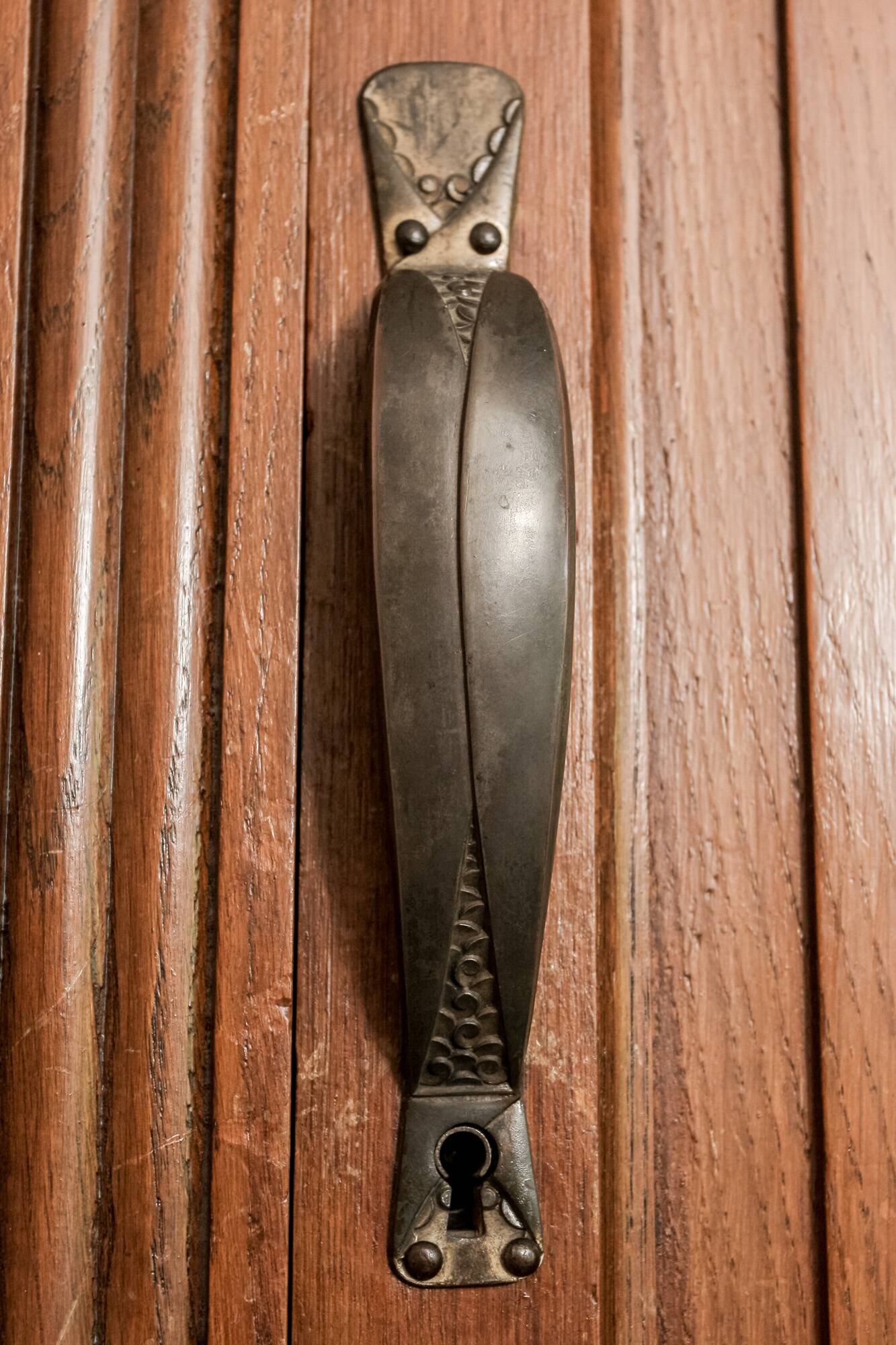 Old solid wood wardrobe with three vintage mirror doors