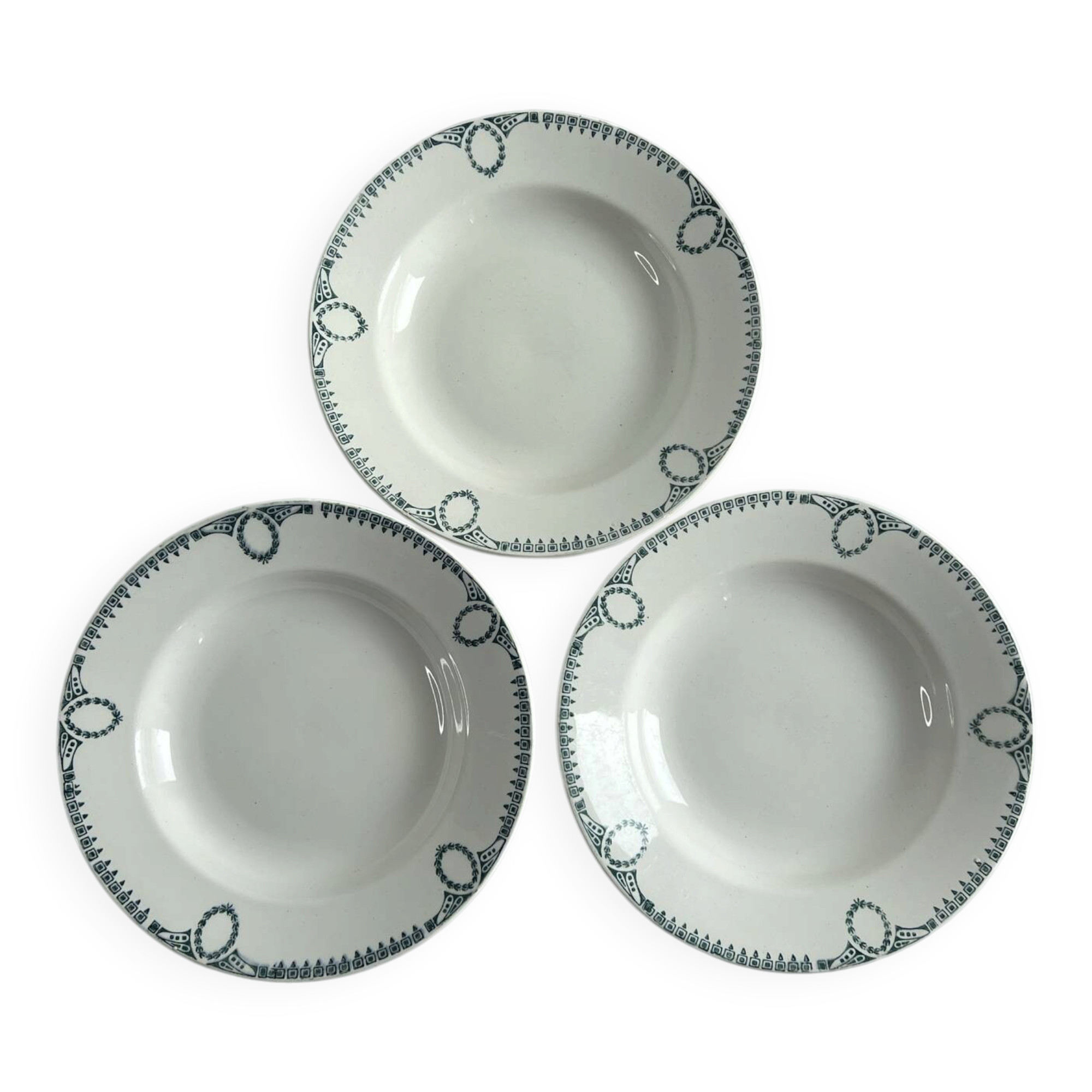 Set of 3 St Amand deep plates with green crown decoration.