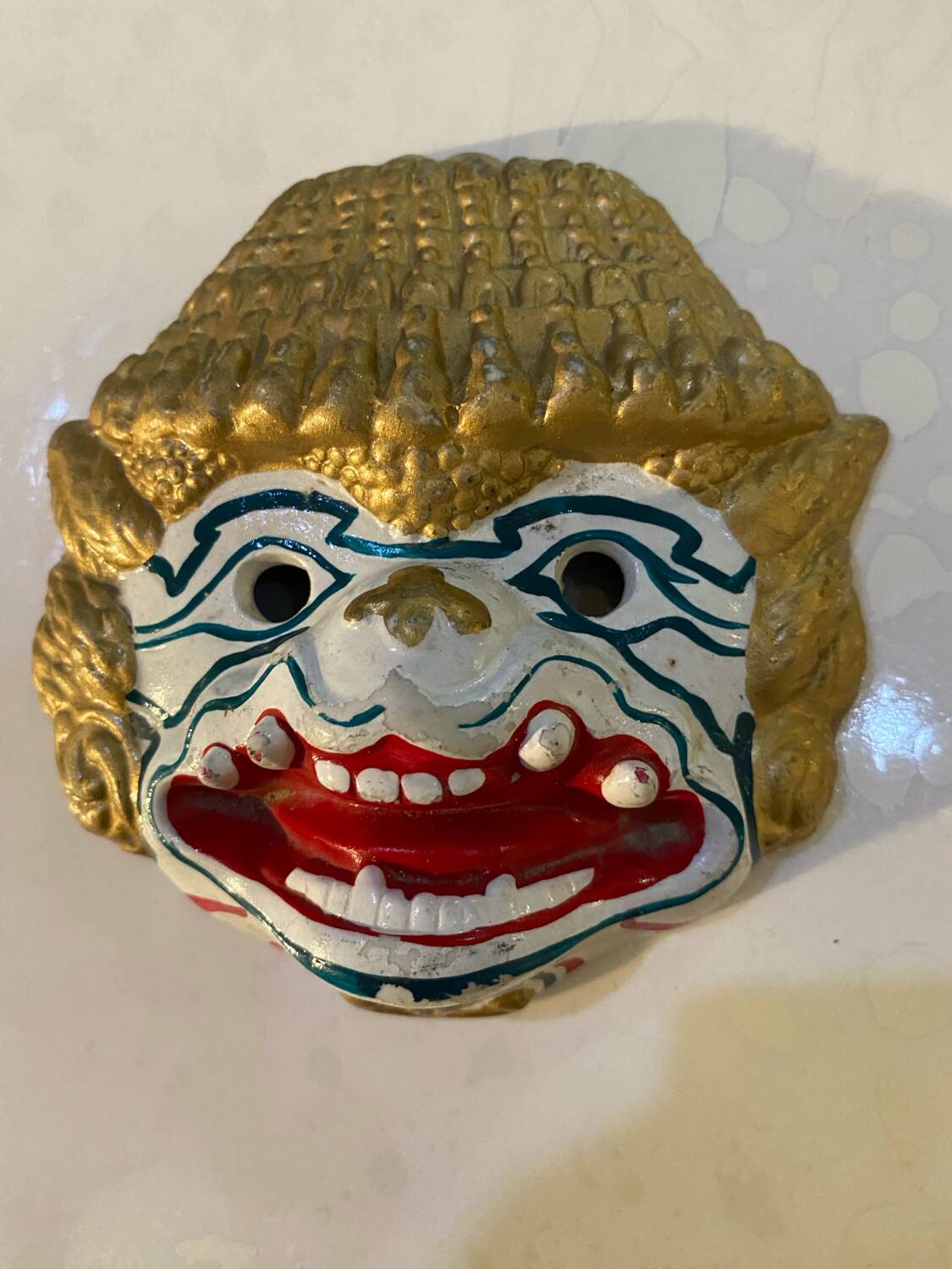 Wall mask of the Hindu monkey god.