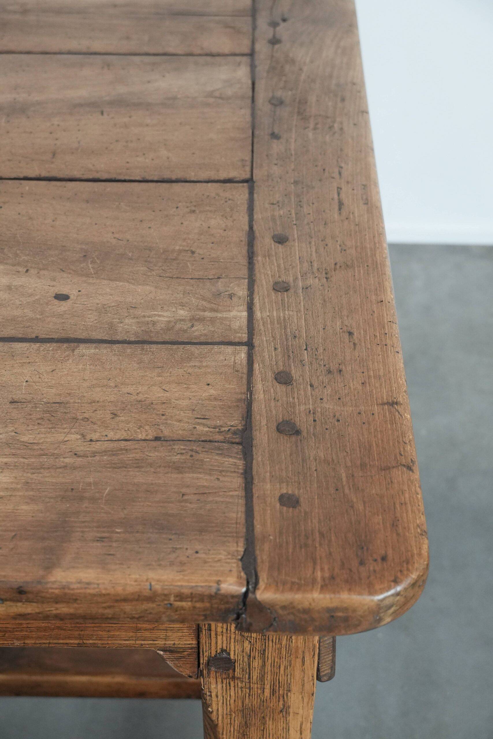 Antique French dining table made of fruitwood  from the late 18th century
