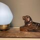 Art Deco lamp with marble, opaline globe & lion sculpture in spelter