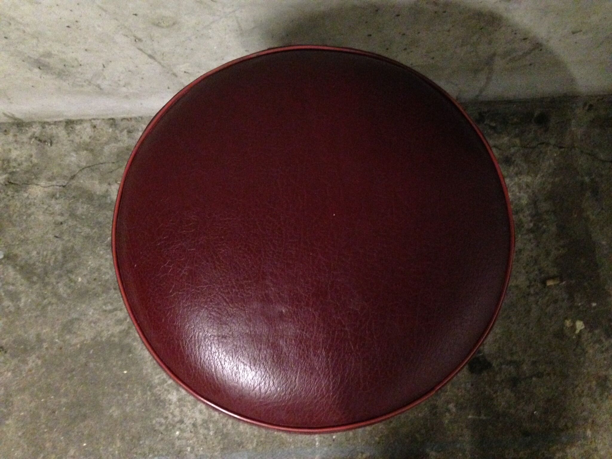 Topped with Burgundy leatherette piano stool