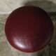 Topped with Burgundy leatherette piano stool