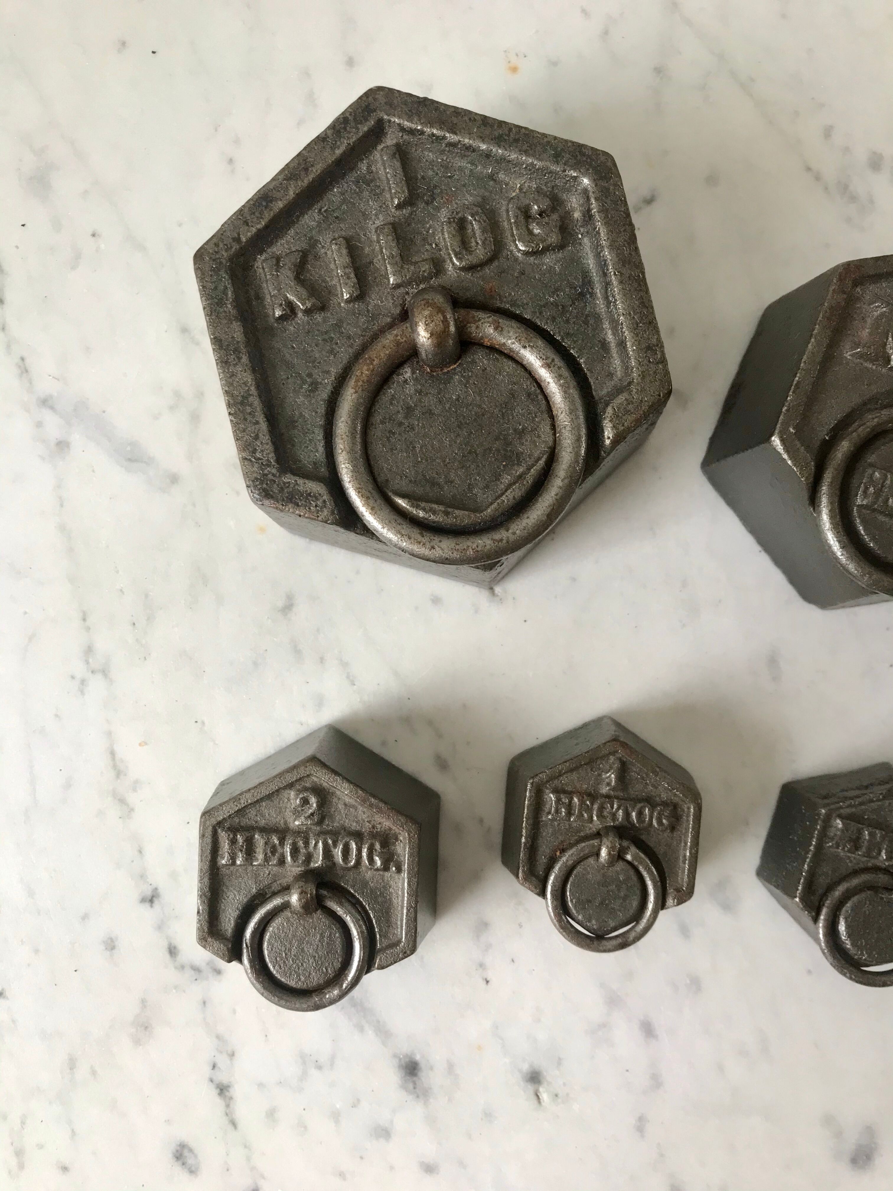 set of old measuring weights early twentieth century