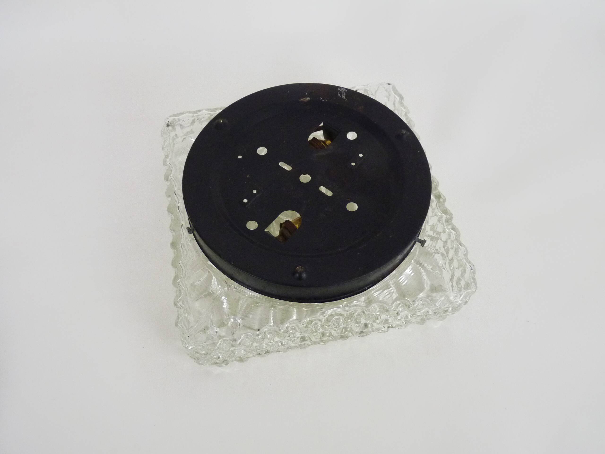 Wall lamp or ceiling light in glass and metal from the 50s and 60s.