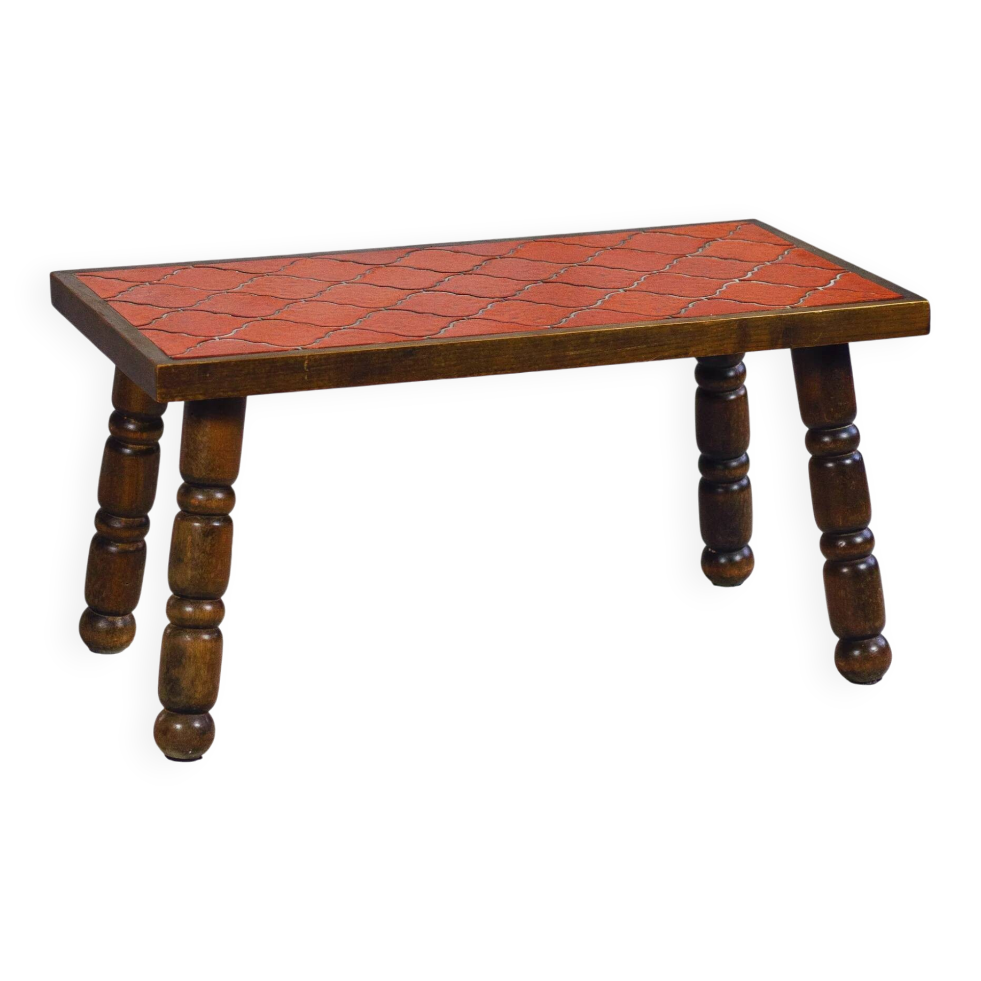 Brutalist coffee table in orange ceramic and solid wood.