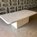 Travertine table with semi-round edges