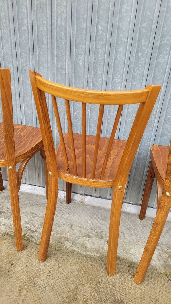 Série de 5 chaises bistrot Baumann signées anciennes