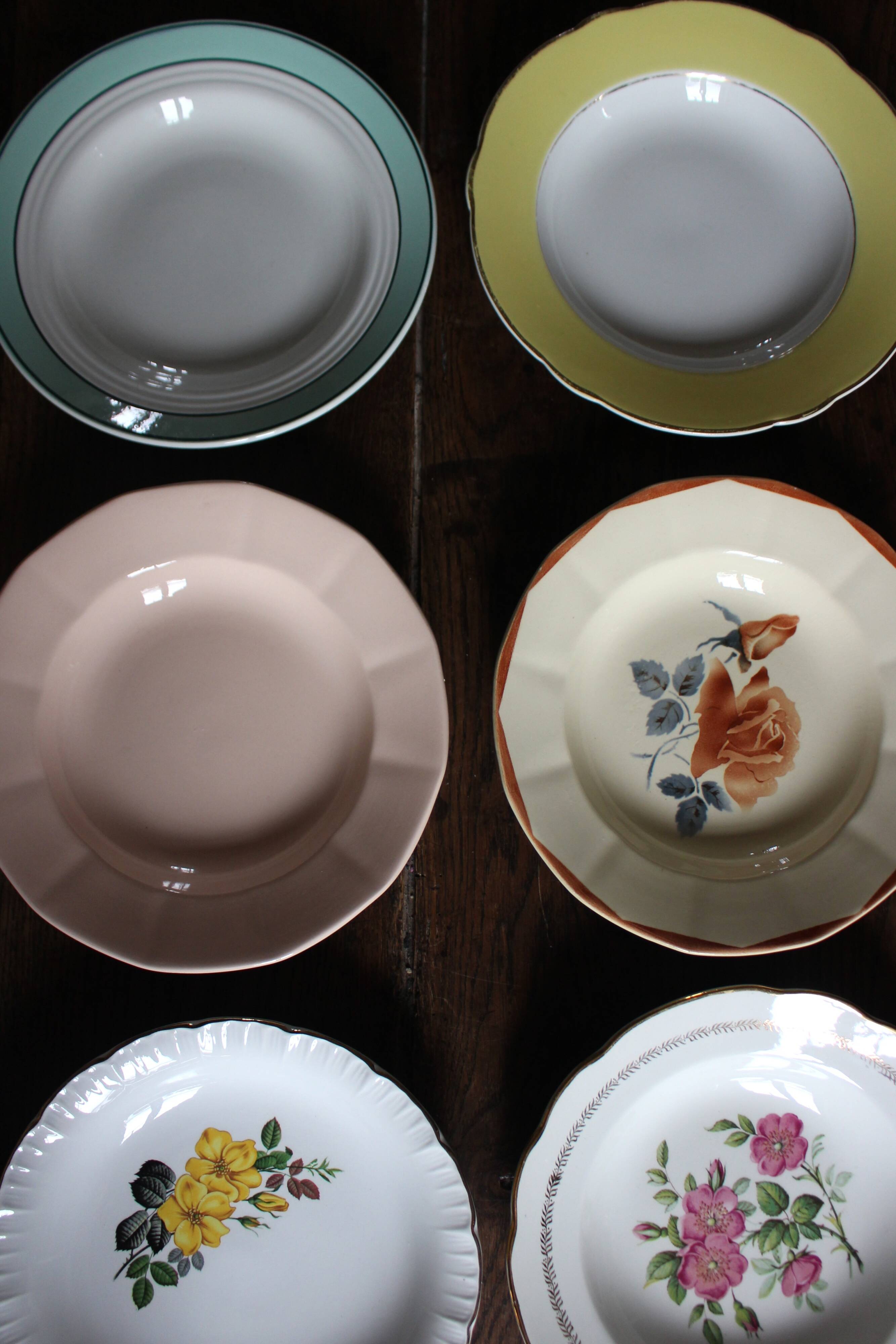 6 mismatched deep plates in floral colours from Digoin, Sarreguemines, Gien.
