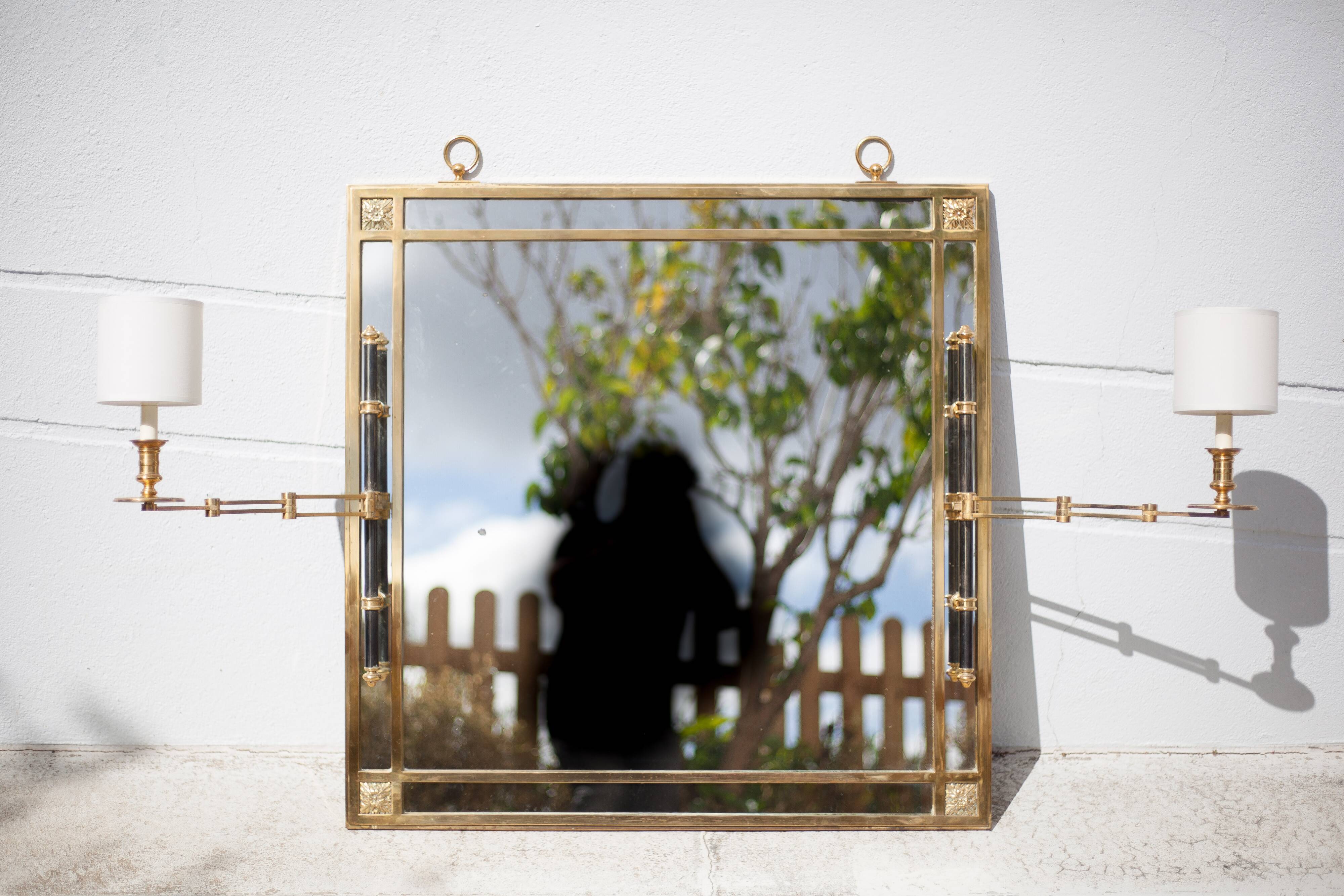 mirror with articulated wall light
