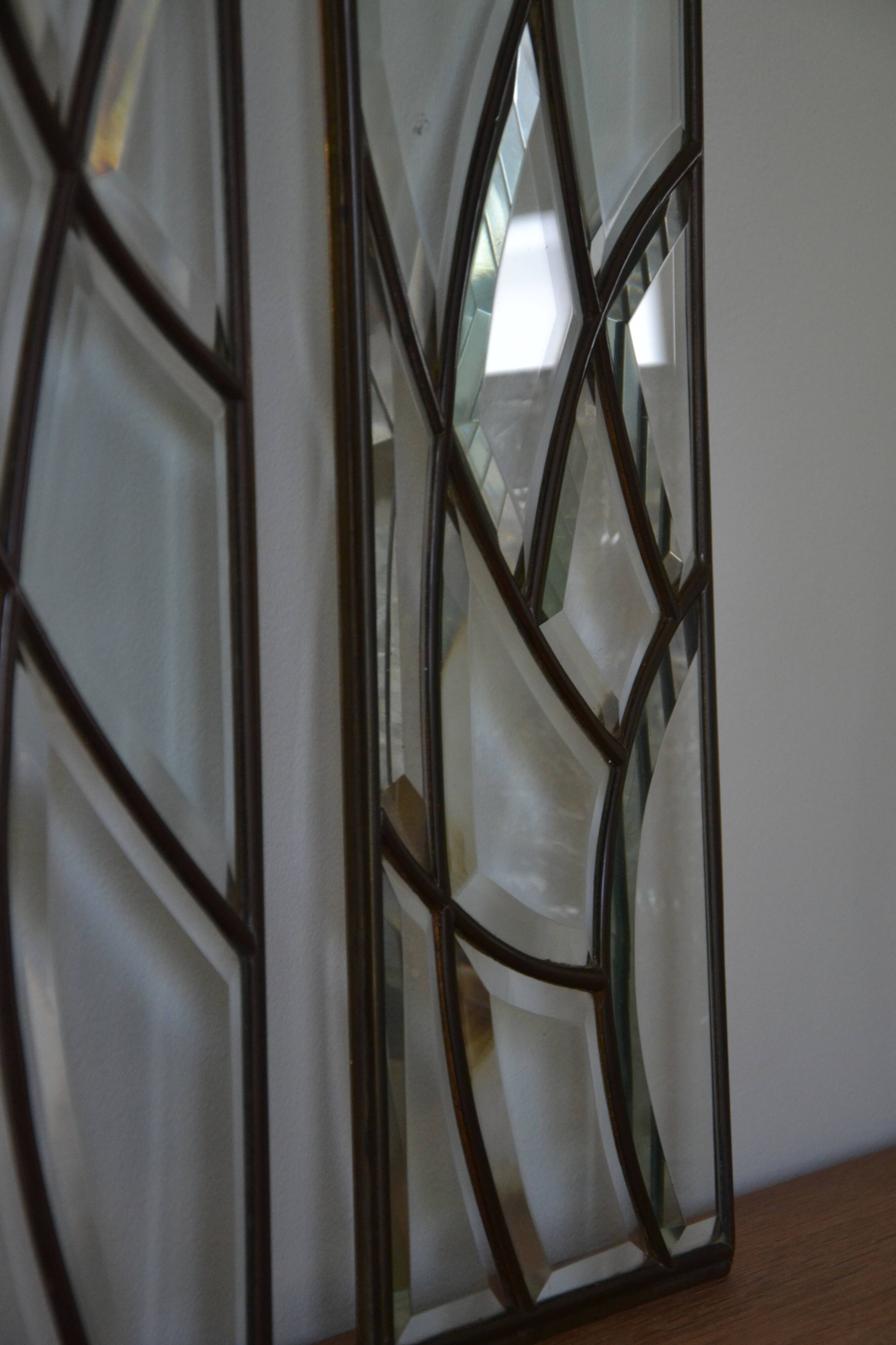 Deux vitraux en verre biseauté et laiton