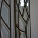 Deux vitraux en verre biseauté et laiton