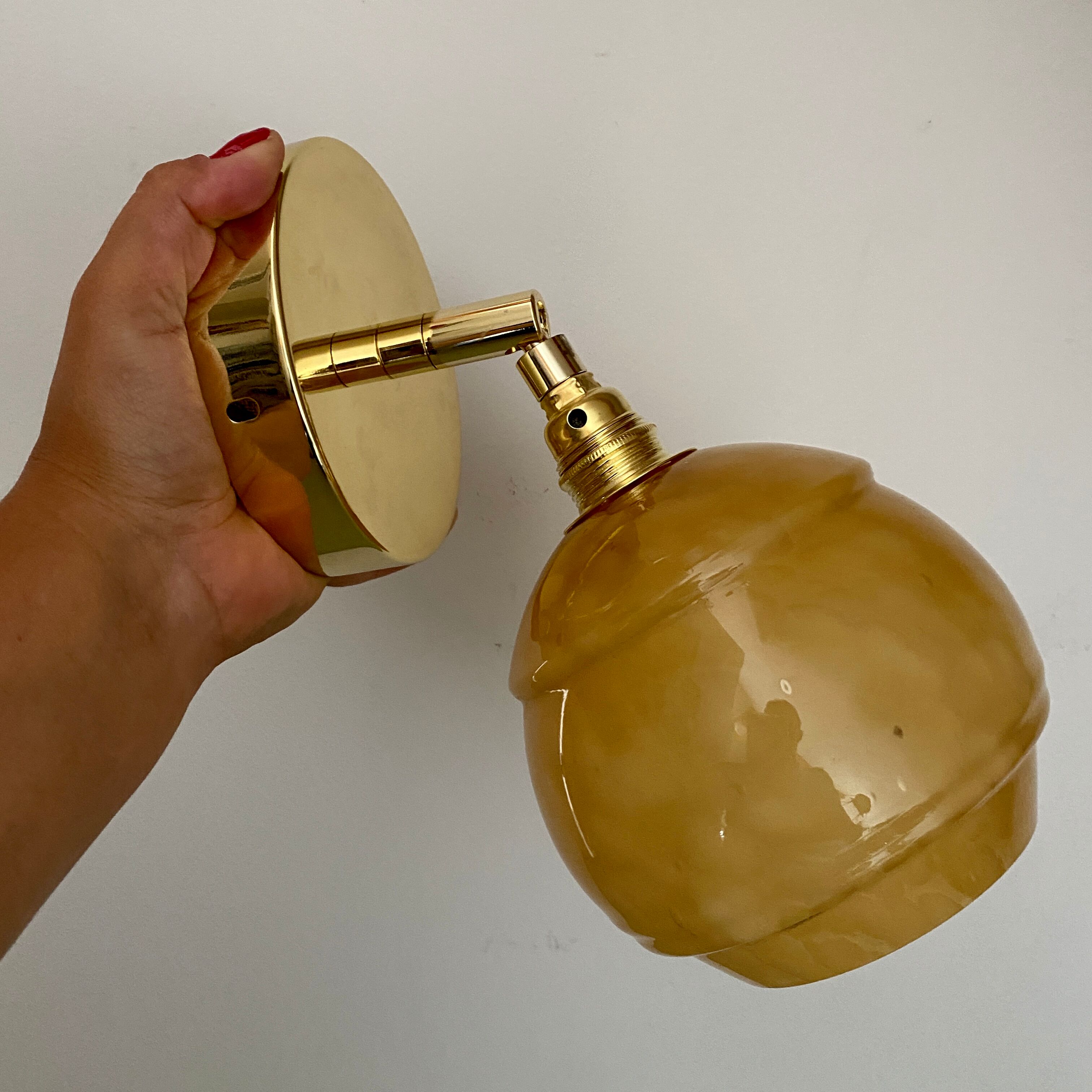 Vintage globe wall light in yellow Clichy glass
