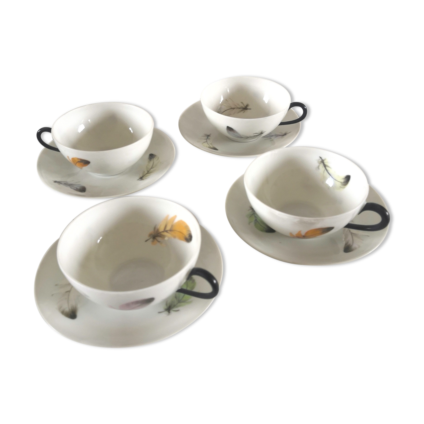 4 cups and cups in fine Limoges porcelain signed LC 60s