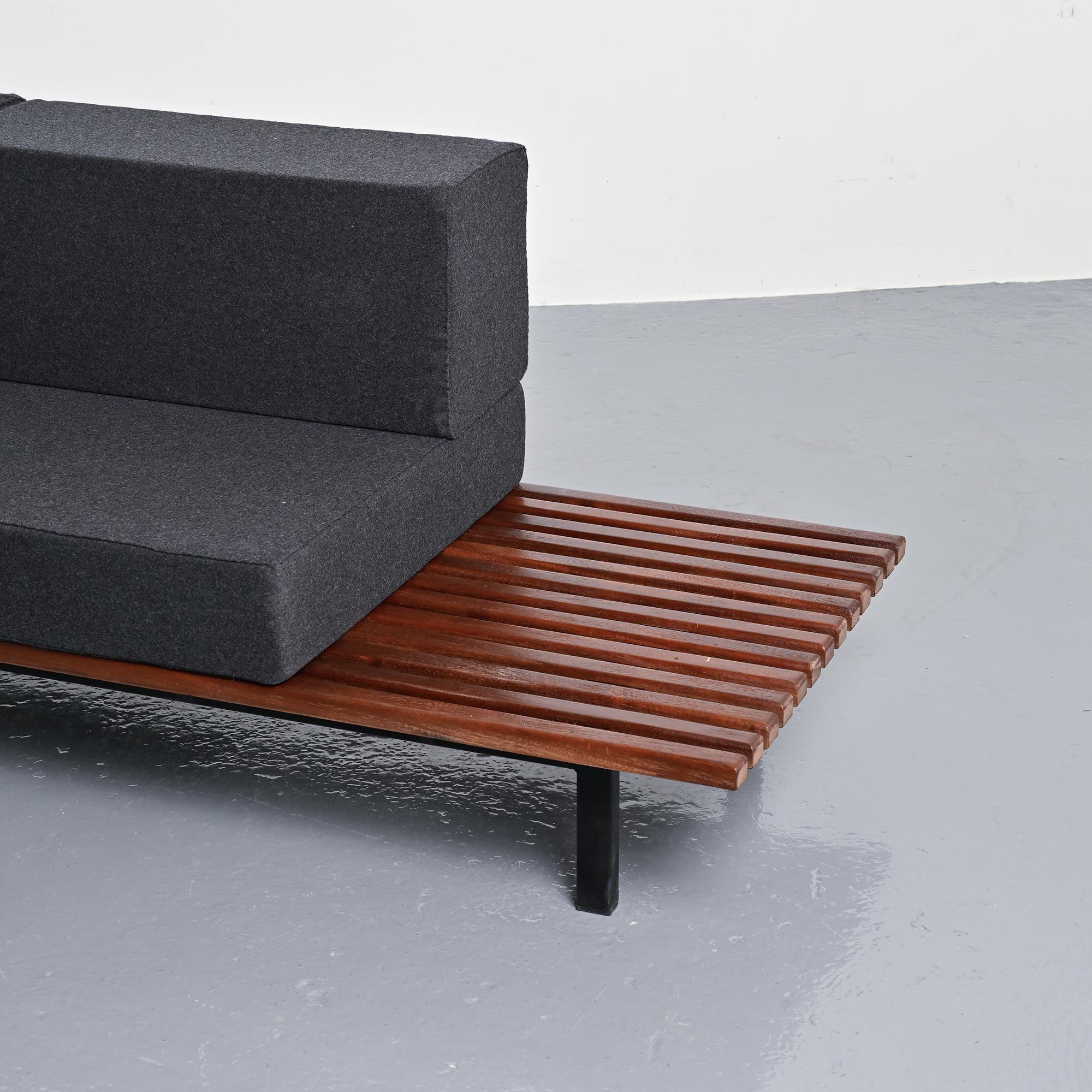 Cansado bench in mahogany by Charlotte Perriand, circa 1962.