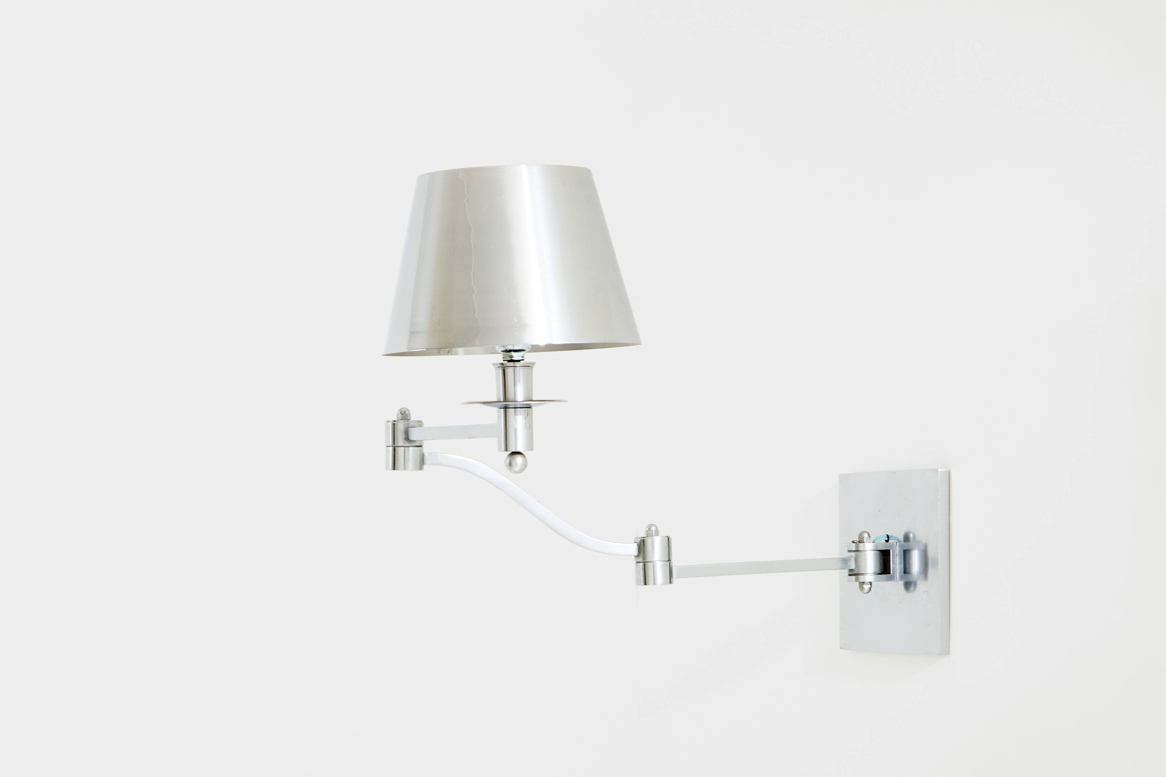Maison Charles adjustable wall light, brushed steel, circa 1960