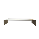 Large curved aluminium tabletop.