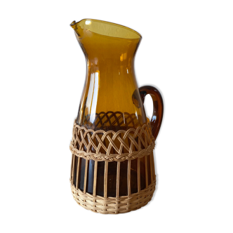 Vintage pitcher in glass and wicker