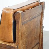 Fauteuil ancien en peau de mouton retapissée