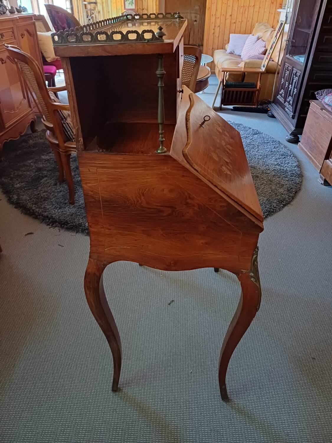 Brown mahogany secretary desk with marquetry