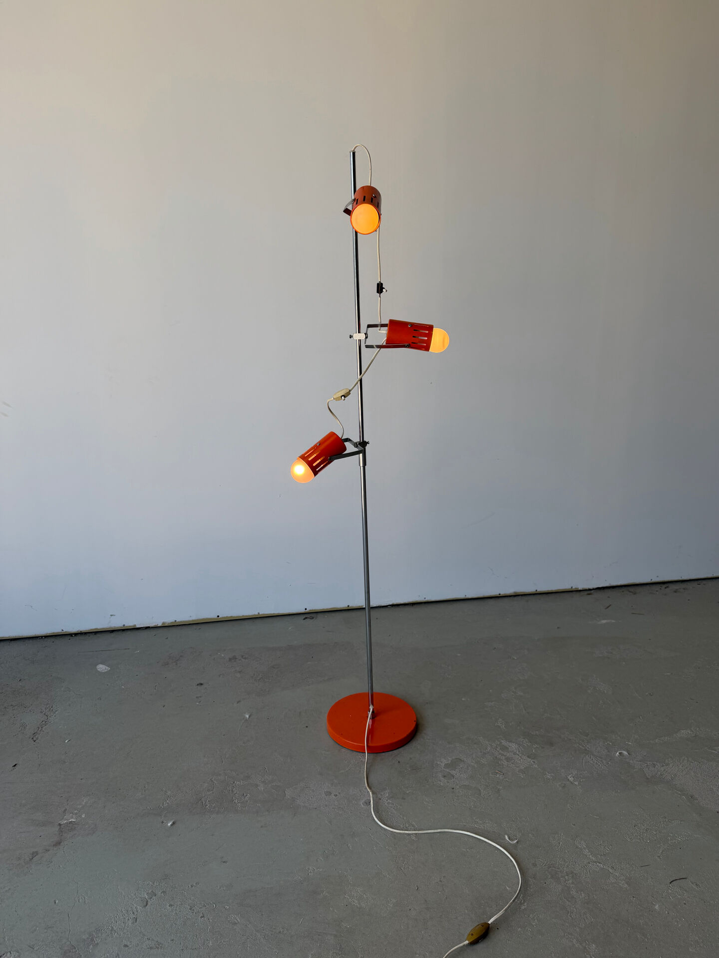 Three-spot floor lamp, Italian design, chrome and vintage orange.