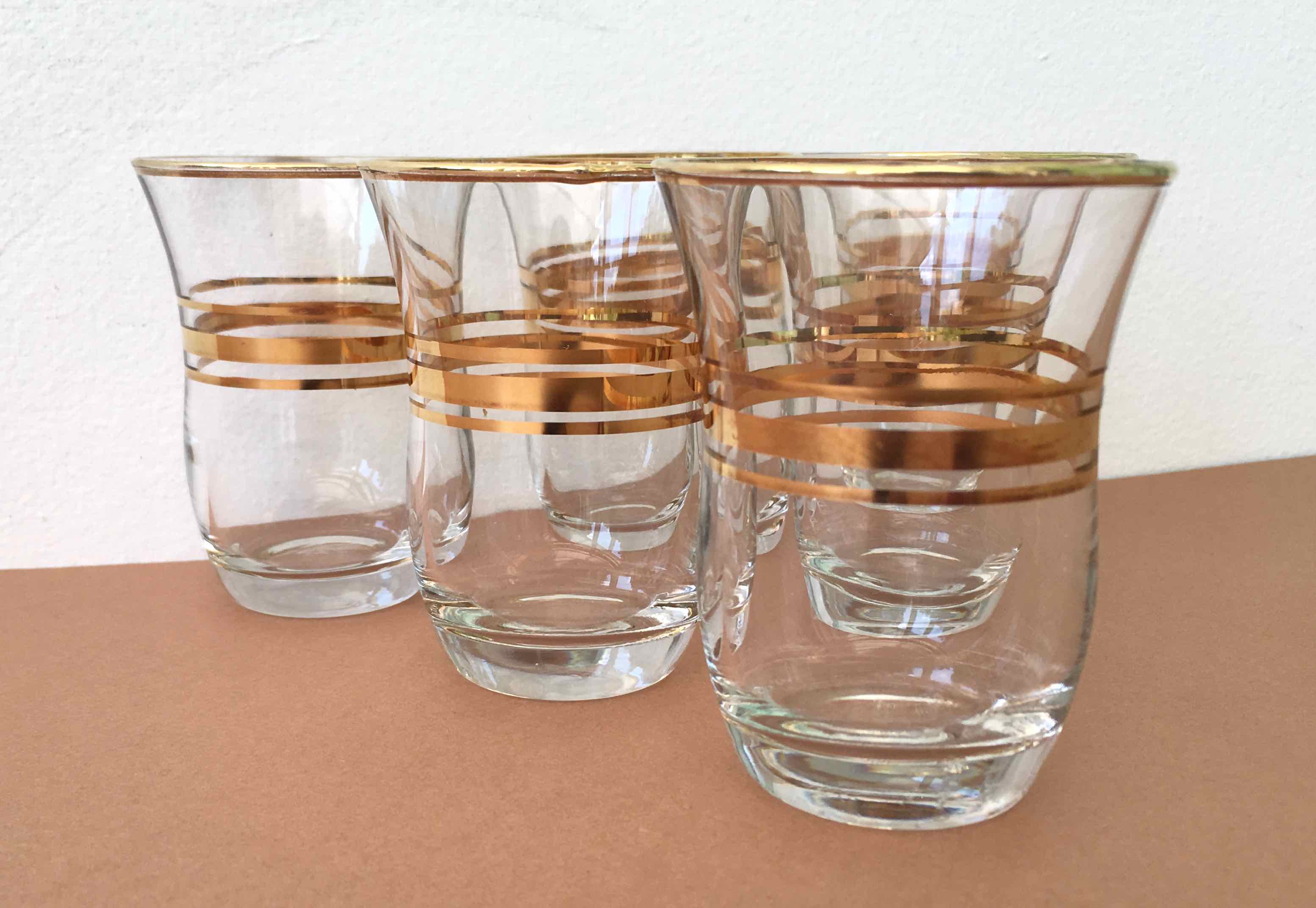 Six glasses of vintage alcohol cups