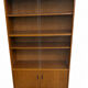 Modernist glass library from the 1960s in wood and black metal.