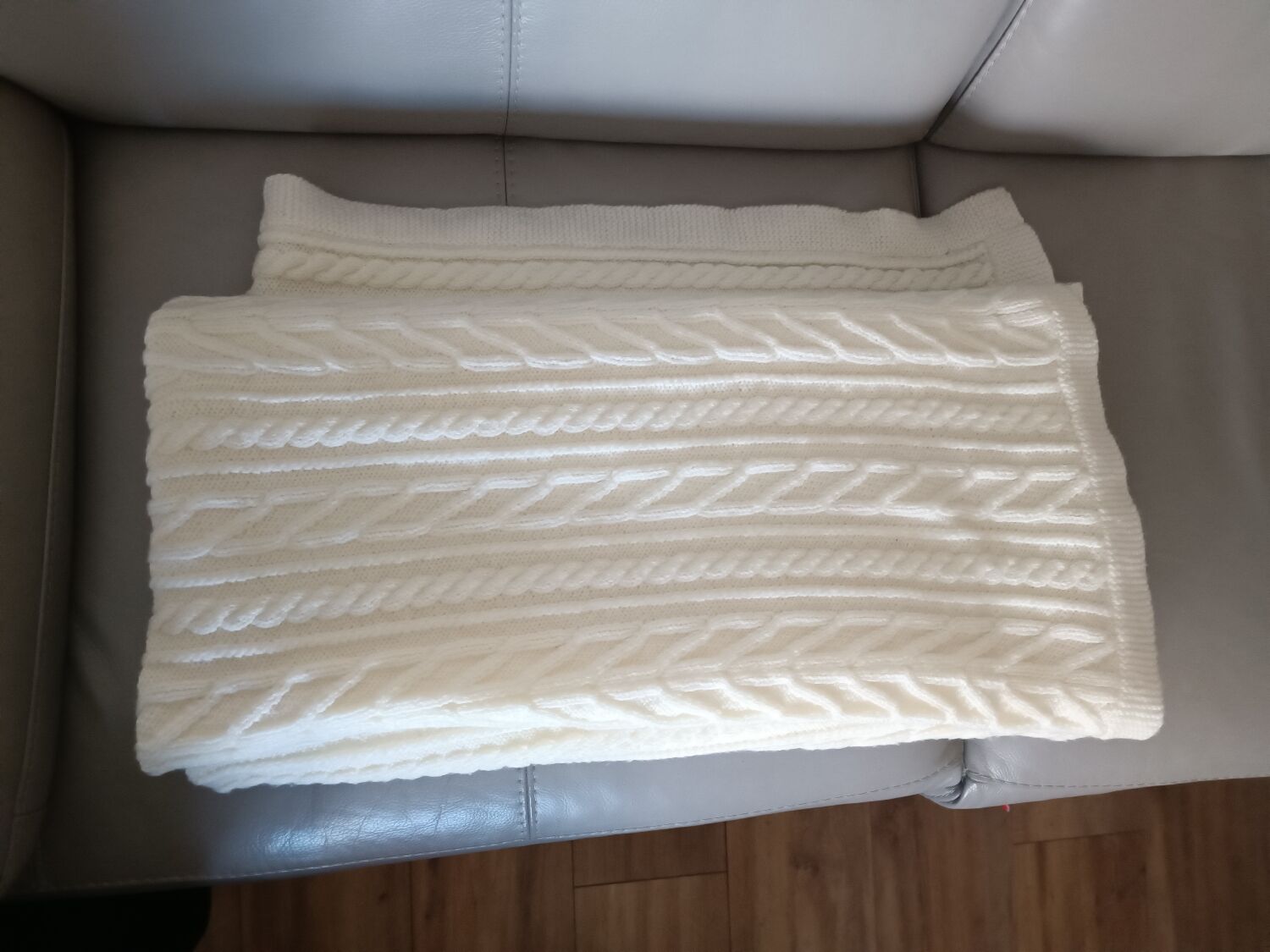 Hand-knitted wool blanket or plaid